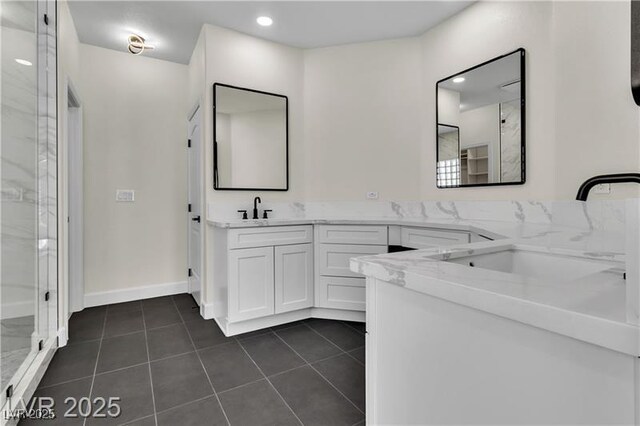 bathroom with vanity and tile patterned floors