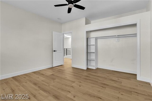 unfurnished bedroom featuring light wood-type flooring, a closet, and ceiling fan