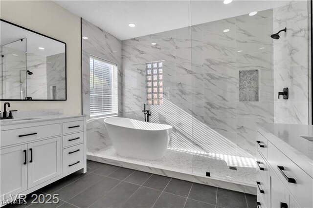 bathroom featuring separate shower and tub, tile patterned flooring, and vanity