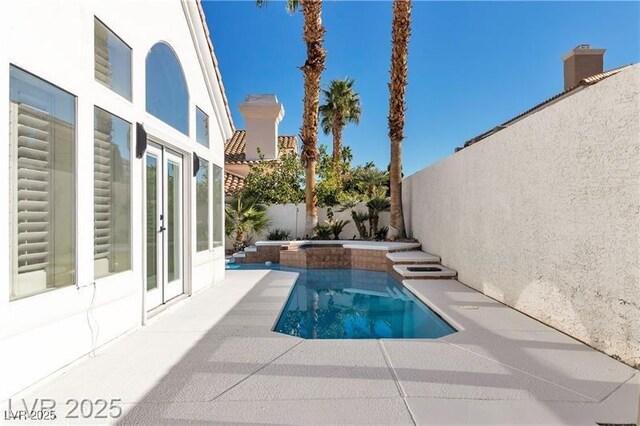 view of pool with a patio