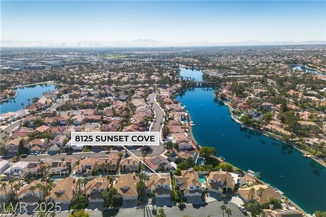 drone / aerial view featuring a water view