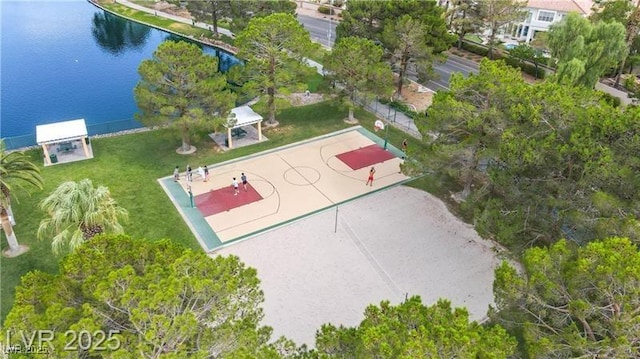 view of basketball court with a gazebo and a water view