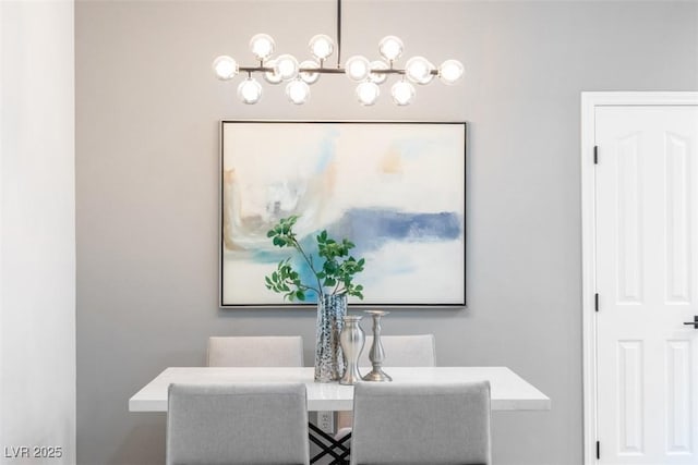 dining area featuring a chandelier