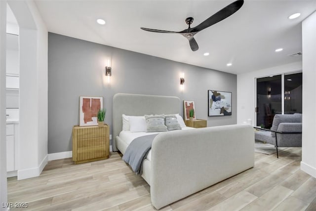 bedroom featuring ceiling fan and light hardwood / wood-style floors