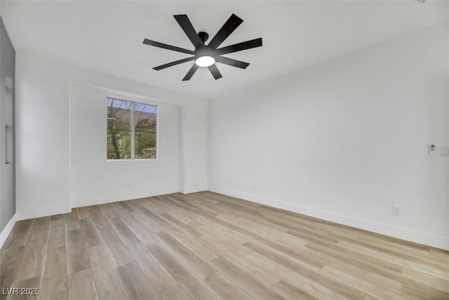 empty room with light wood-type flooring and ceiling fan