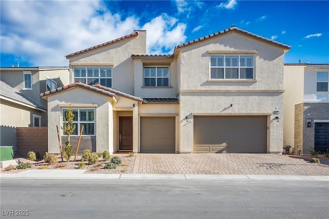 view of front of home with a garage