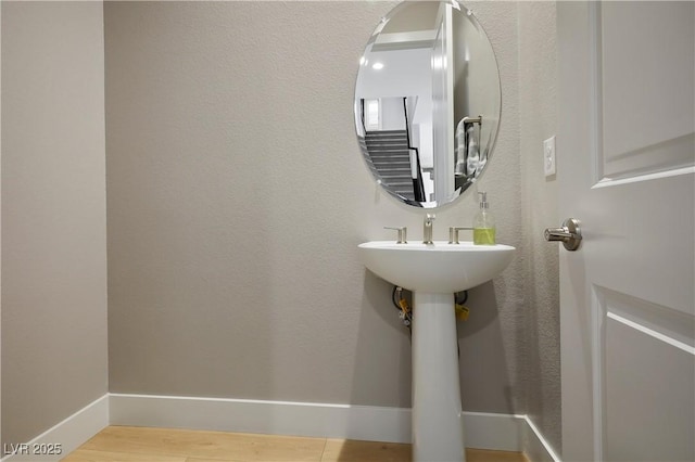 bathroom featuring hardwood / wood-style flooring