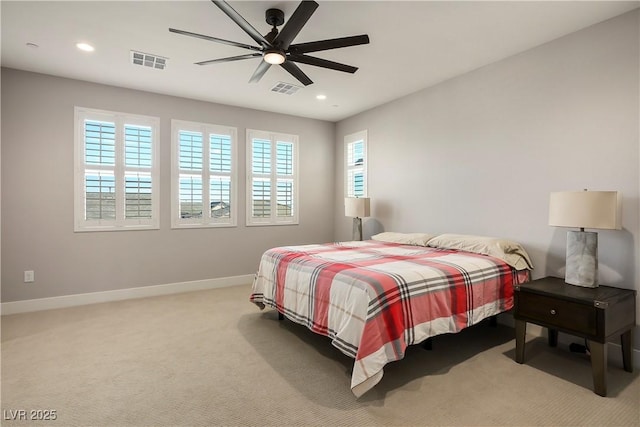 carpeted bedroom with ceiling fan