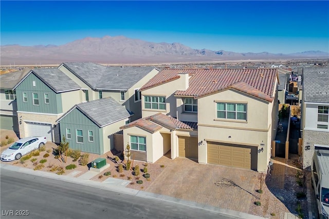 view of front of property with a mountain view