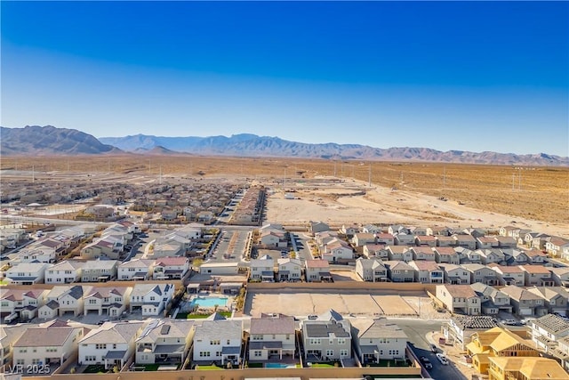 bird's eye view with a mountain view