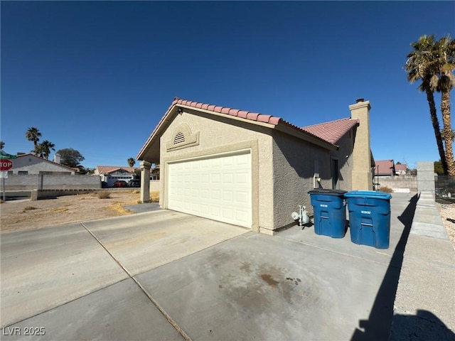 view of home's exterior with a garage