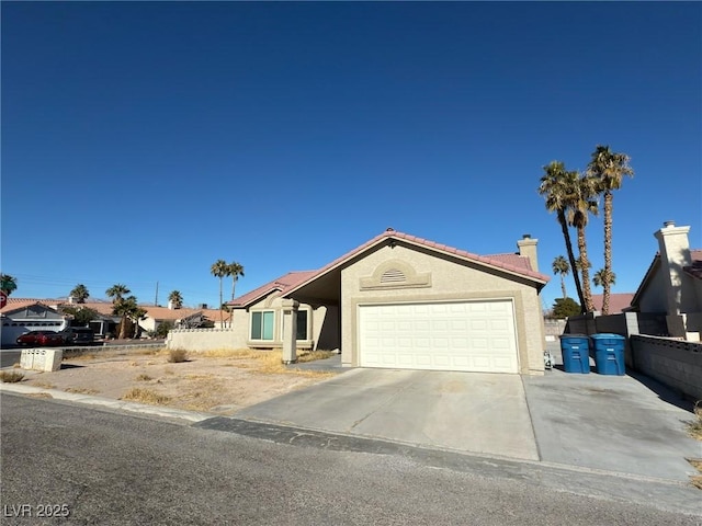 ranch-style house featuring a garage