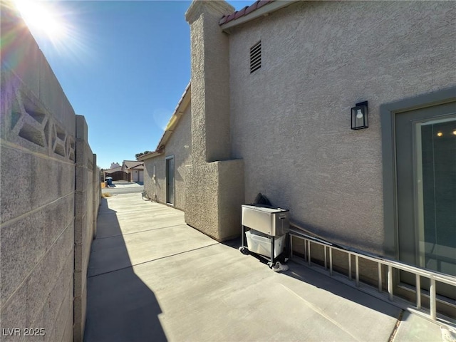 view of home's exterior with a patio