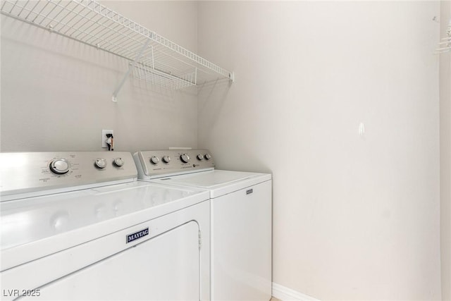 laundry room with washer and dryer