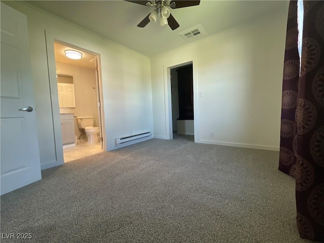 unfurnished bedroom with ensuite bath, baseboard heating, crown molding, carpet, and ceiling fan