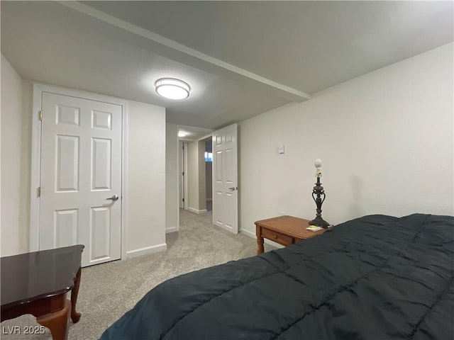 bedroom with light colored carpet