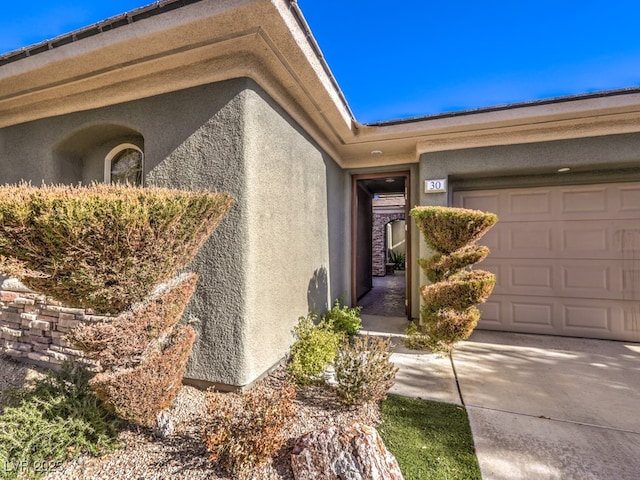 entrance to property with a garage