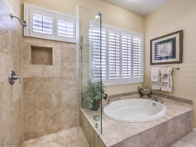 bathroom with independent shower and bath