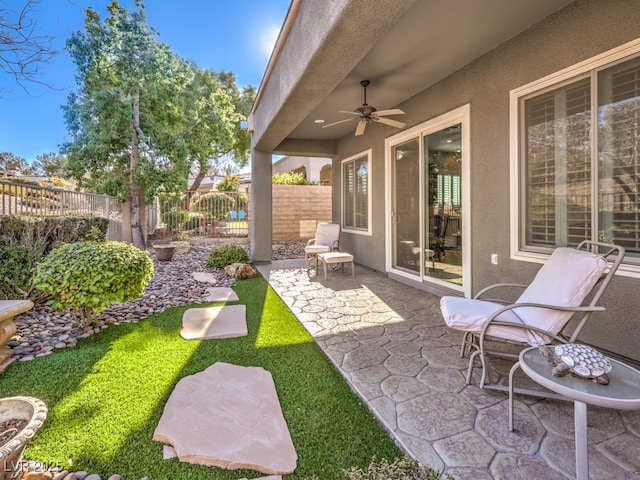 view of patio / terrace with ceiling fan