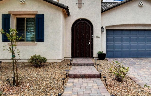 entrance to property with a garage