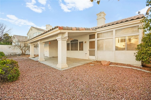 rear view of property with a patio