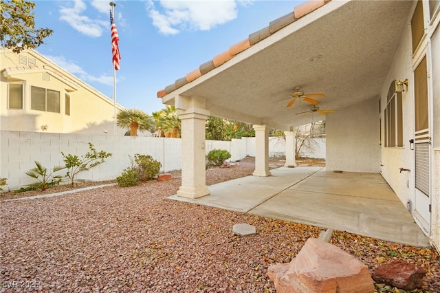 view of patio with ceiling fan