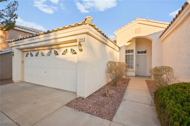 property entrance featuring a garage