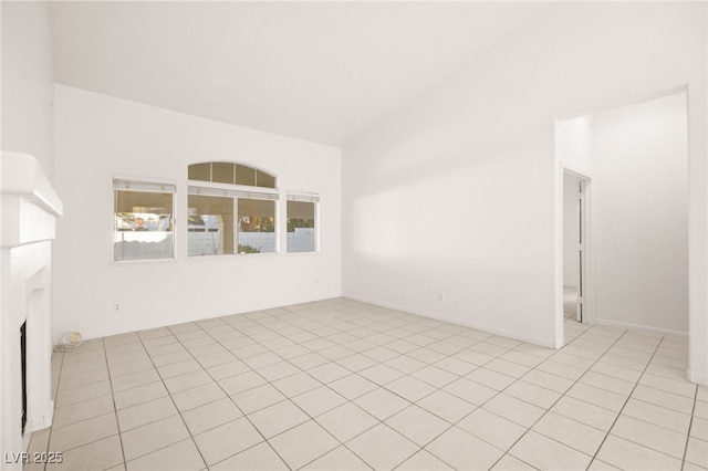 unfurnished room with light tile patterned floors