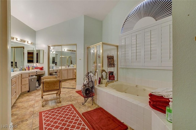 bathroom with high vaulted ceiling, plus walk in shower, and vanity