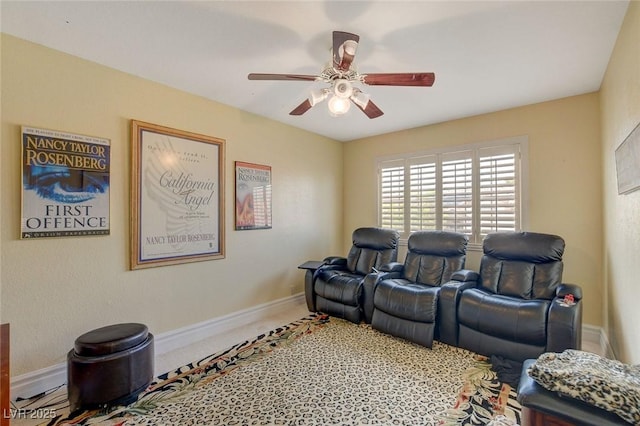 home theater room featuring ceiling fan