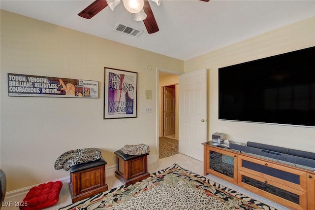 living room with ceiling fan