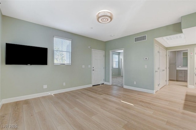 empty room featuring light hardwood / wood-style floors