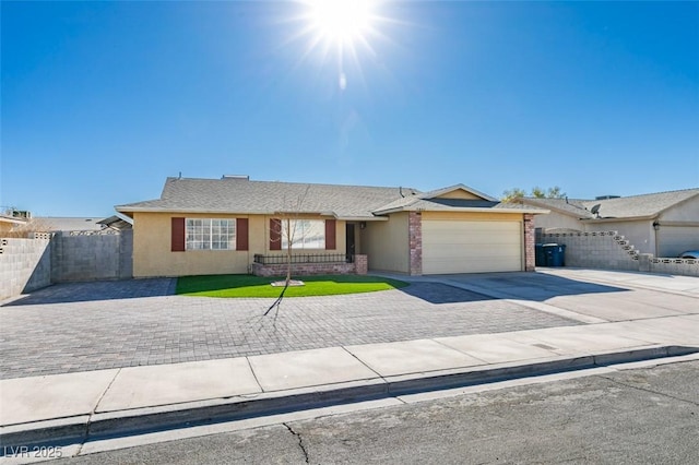 single story home featuring a garage