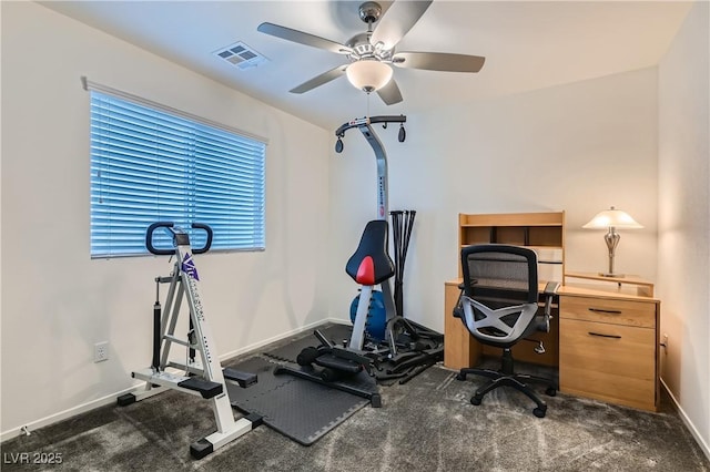 exercise room with ceiling fan