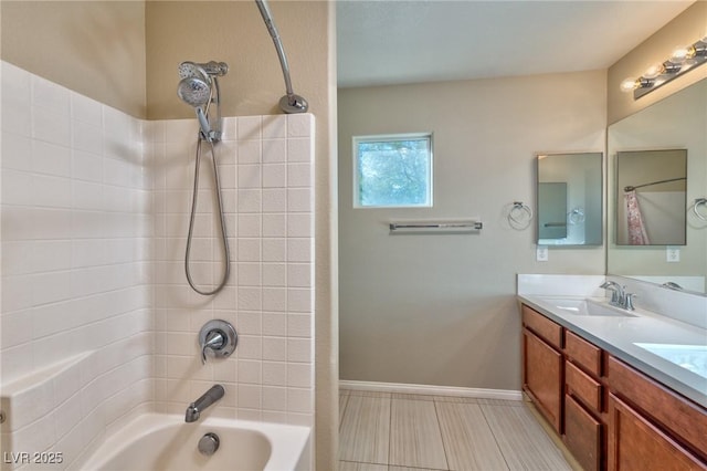 bathroom with shower / washtub combination and vanity