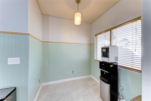 tiled office featuring wood walls