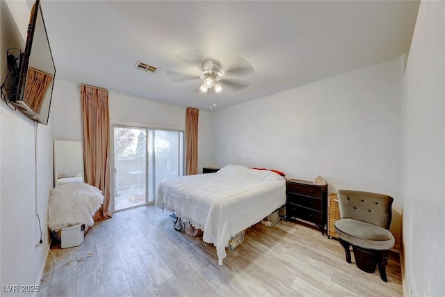 bedroom with ceiling fan, light wood-type flooring, and access to outside