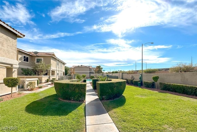 surrounding community featuring a lawn