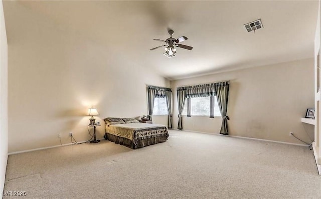 bedroom featuring ceiling fan, lofted ceiling, and carpet floors