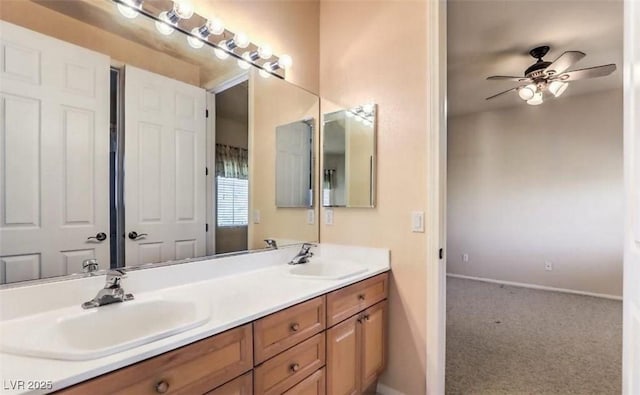 bathroom featuring ceiling fan and vanity