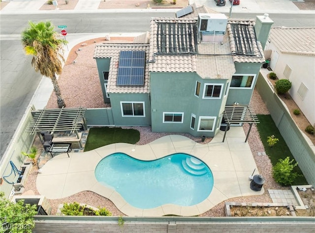 view of swimming pool featuring a patio area and a fenced backyard