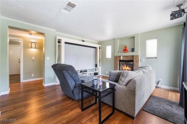 living room featuring a healthy amount of sunlight and hardwood / wood-style floors