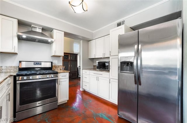 kitchen featuring appliances with stainless steel finishes, ornamental molding, light stone counters, white cabinetry, and wall chimney range hood