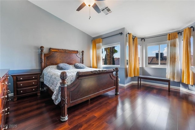 bedroom featuring vaulted ceiling, ceiling fan, and dark hardwood / wood-style floors