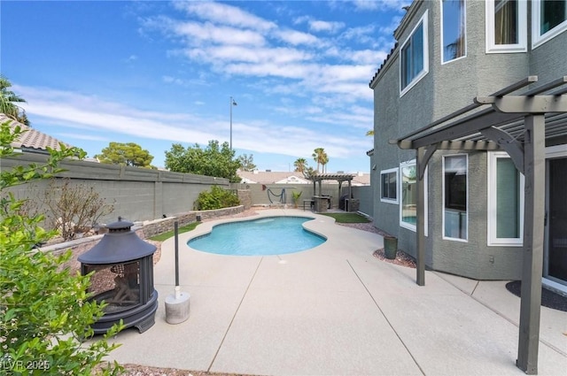 view of pool featuring a patio area and a pergola