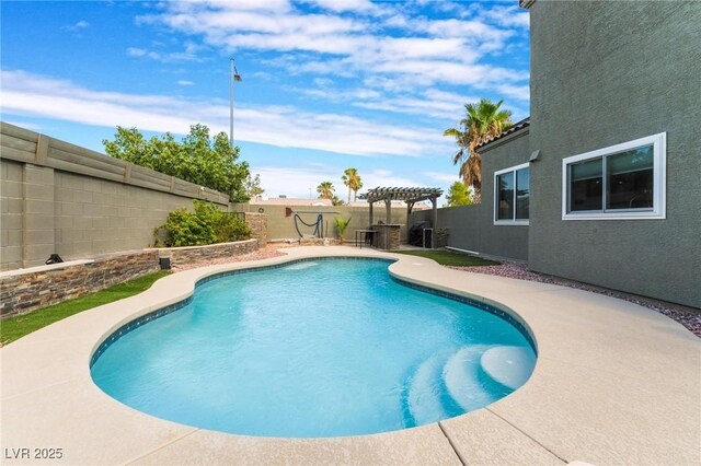 view of swimming pool with a patio and a pergola