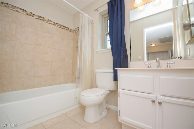 full bathroom featuring toilet, tile patterned flooring, vanity, and shower / tub combo with curtain