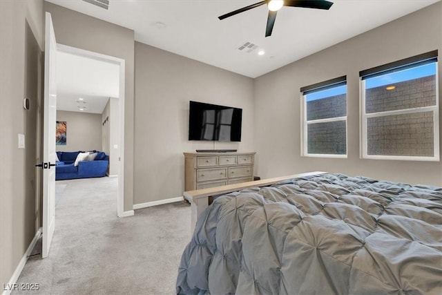 bedroom with light colored carpet and ceiling fan