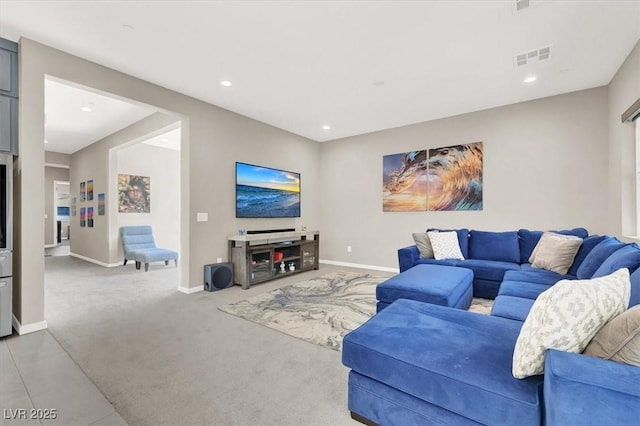 living room featuring light carpet