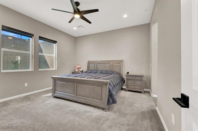 carpeted bedroom featuring ceiling fan